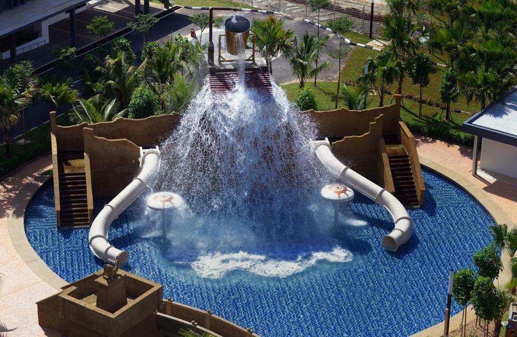 Cozy Swiss Garden Beach Resort Residence Kampung Sungai Karang Buitenkant foto